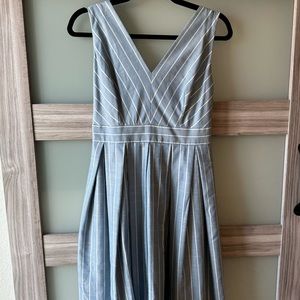 Gal meets glam dress with bow back